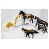 Plastic and Hollow Metal Copper-Toned Toy Horses
