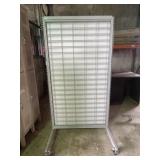 One Rolling Display Rack With Adjustable Shelves