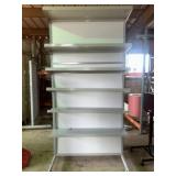 One Rolling Display Rack With Adjustable Shelves