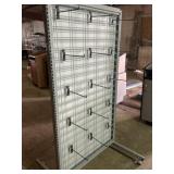 One Rolling Display Rack With Adjustable Shelves