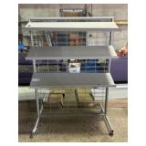 One Rolling Display Rack With Adjustable Shelves