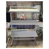 One Rolling Display Rack With Adjustable Shelves