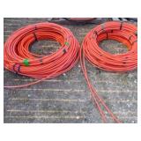 Half inch orange  spool of tubing