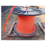 Half inch orange  spool of tubing