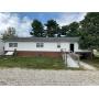 10.21.25 COUNTRY HOME WITH 2-CAR DETACHED GARAGE ON 1.56+/- ACRES! SELLING REGARDLESS OF PRICE!