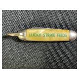 LUCKY STRIKE FEEDS DOG FOOD SINGLE BLADE KEY CHAIN