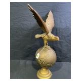 BRASS EAGLE ON WORLD SCULPTURE - 24" TALL X 21"