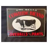 COWHIDE BRAND OVERALLS AND PANTS PORCELAIN SIGN -