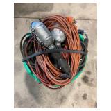 BASKET FULL OF EXTENSION CORDS AND JUMPER CABLES