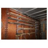 LARGE LOT OF PIPE POLES, LOG ROLLERS AND UTILITY