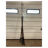 LARGE LOT OF ASSORTED FISHING RODS - SOME REELS