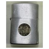 VINTAGE ZIPPO WITH ST. CHRISTOPHER MEDAL