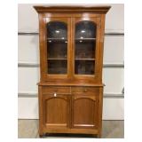 ANTIQUE 2 PC. GLASS FRONT STEP BACK CUPBOARD -