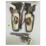 PAIR OF HUBLEY RODEO CAP GUNS WITH HOLSTERS