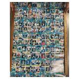 LARGE LOT OF UNCUT BASEBALL CARDS IN