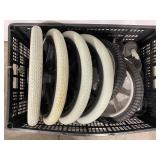 PLASTIC CRATE FULL OF REPLACEMENT WHEELS FOR