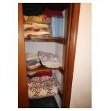 CONTENTS OF CLOSET IN HALLWAY - QUILTS AND