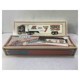 723.  Ertl Alan Kulwicki Racing Transporters Past