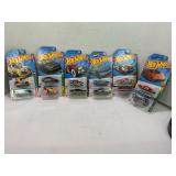 LOT OF 12 HOT WHEELS CARS IN PROTECTIVE CASES