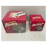 Lot of two original slinkys in original boxes
