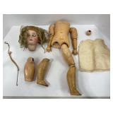 EARLY GERMAN SLEEPY EYED PORCELAIN HEAD DOLL WITH