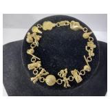 14KT GOLD GOLF CHARM BRACELET 7 1/2" 9.7G