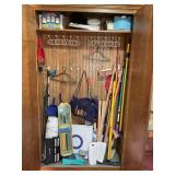 CONTENTS OF TALL CABINET IN GARAGE- YARDSTICKS,