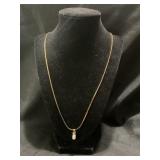 10 KT GOLD NECKLACE WITH STONE PENDANT - 6.21