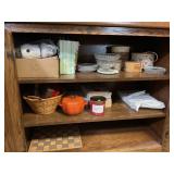 CONTENTS OF CABINET IN KITCHEN - CANDLES, BOOKS,