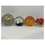 LOT OF 4 HAND BLOWN PAPERWEIGHTS. 2 FLOWER DESIGN.