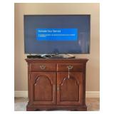 LG 48" FLATSCREEN TV WITH STAND AND DVD PLAYER