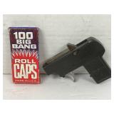 VINTAGE BLACK TOY CAP GUN WITH BOX OF CAPS