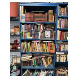 METAL SHELVING UNIT WITH LARGE SELECTION OF BOOKS-