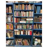 METAL SHELVING UNIT WITH LARGE SELECTION OF BOOKS-