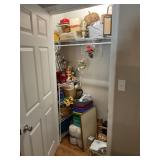 CONTENTS OF CLOSET IN LIVING ROOM - CAT FIGURINES,
