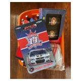 TOTE FULL OF ASSORTED TONY STEWART COLLECTIBLES