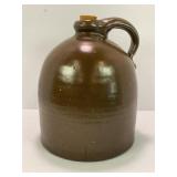 ONE GALLON PRIMITIVE STONEWARE CROCK WHISKEY JUG