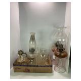 LARGE LOT OF OIL LAMPS AND CHIMNEYS