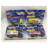 LOT OF 4 HOT WHEELS HAULERS IN ORIGINAL PACKAGE