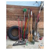 LARGE LOT OF ASSORTED HAND TOOLS - SHOVELS, BROOMS