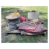 SKID OF SHOP CURTAINS, FUEL TANKS, GARDEN HOSE AND