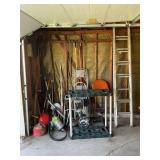 LARGE LOT OF HAND YARD TOOLS - BROOMS, RAKES,