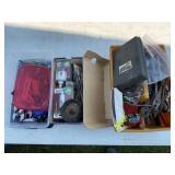 PLASTIC CARRIER WITH ADJUSTABLE WRENCHES, TAPE,