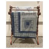 QUILT RACK WITH TWO MACHINE STITCHED QUILTS
