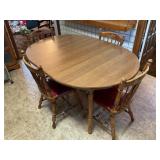 WOOD KITCHEN TABLE WITH 4 UPHOLSTERED CHAIRS AND