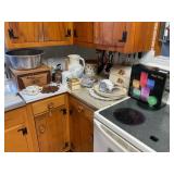 CONTENTS OF COUNTERTOP IN KITCHEN - CAKE PANS,
