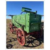 Green Wooden Horse-Drawn Wagon with Red Wheels