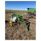 Green Steel-Wheeled Horse-Drawn Plow