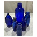 Six Cobalt Blue Glass Bottles