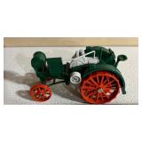Diecast Model Tractor with Green and Orange Design
